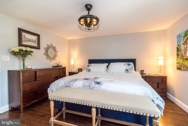 bedroom featuring dark wood-type flooring