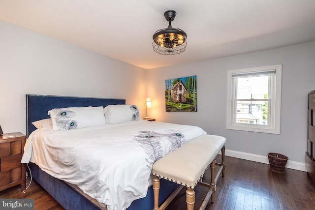 bedroom featuring dark hardwood / wood-style flooring