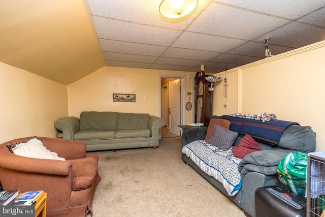 carpeted living room with a paneled ceiling