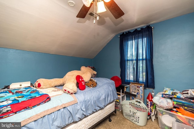 bedroom with carpet flooring, ceiling fan, and vaulted ceiling