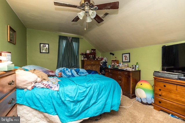 carpeted bedroom featuring ceiling fan and lofted ceiling