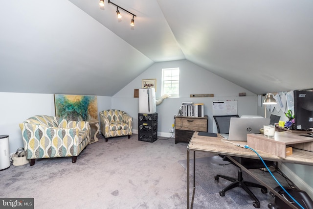 office featuring carpet and vaulted ceiling