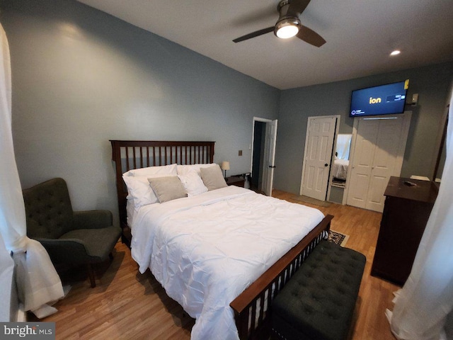 bedroom with ceiling fan and light wood-type flooring