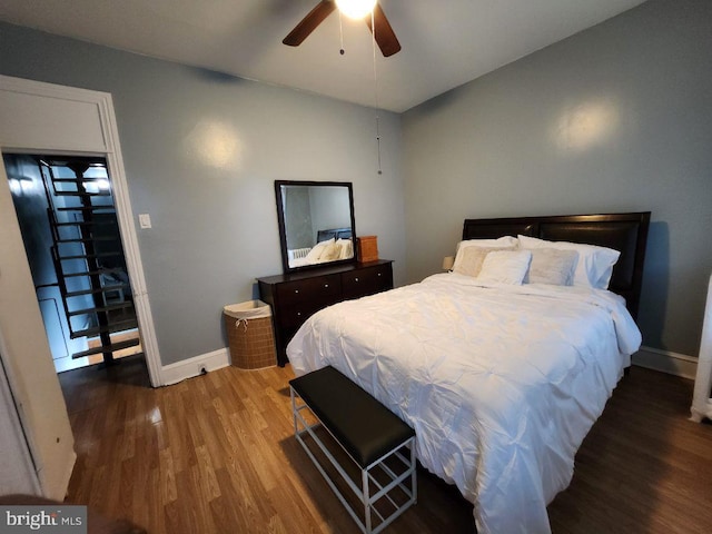 bedroom featuring ceiling fan and hardwood / wood-style floors