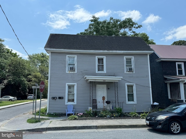 view of front facade featuring cooling unit