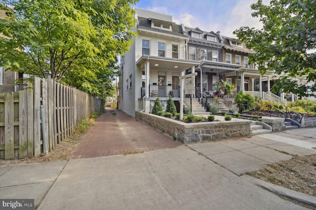 view of property with a porch