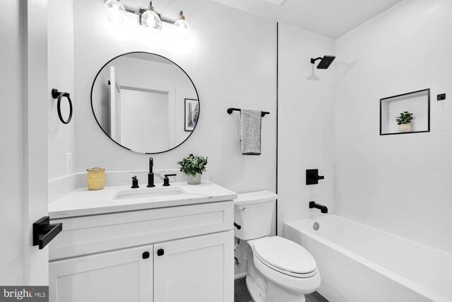 full bathroom featuring vanity,  shower combination, and toilet