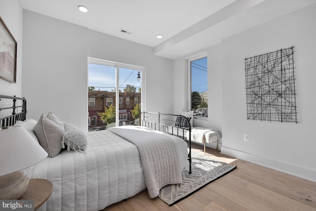 bedroom featuring wood-type flooring