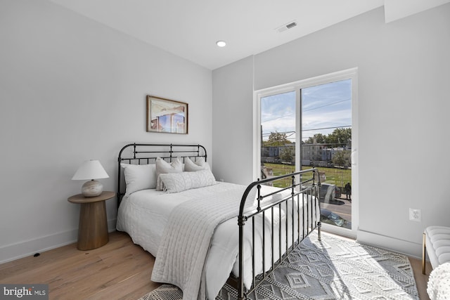 bedroom featuring wood-type flooring