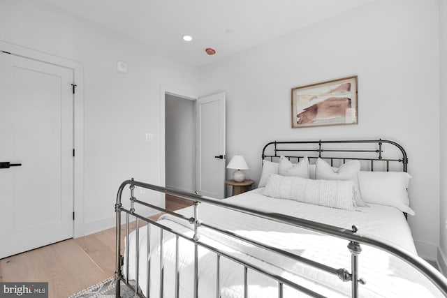 bedroom featuring light hardwood / wood-style flooring