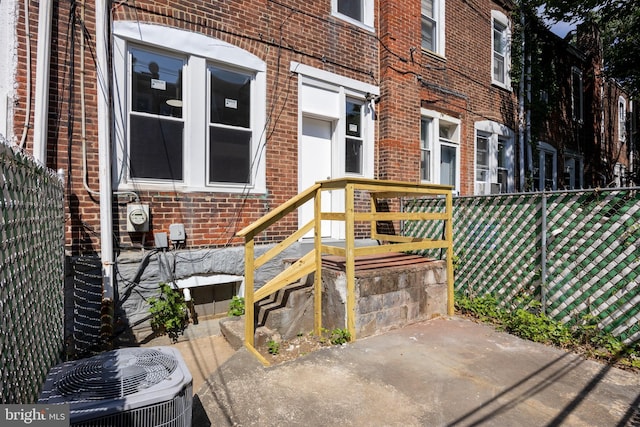 entrance to property with central air condition unit