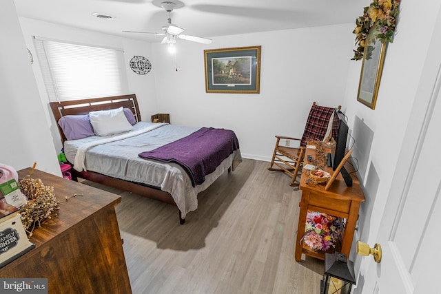 bedroom featuring ceiling fan and light wood-type flooring