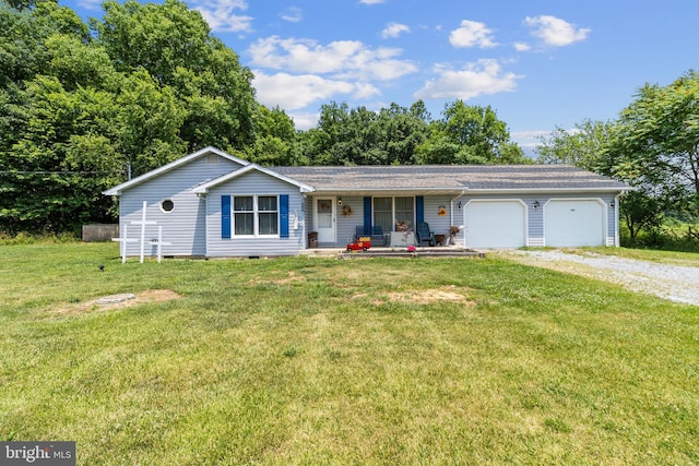 ranch-style house with a front yard, a garage, and covered porch