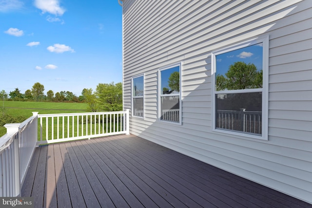 deck featuring a lawn