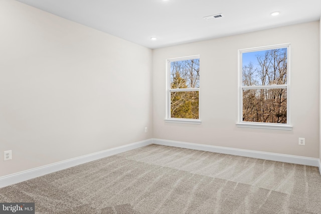 view of carpeted spare room