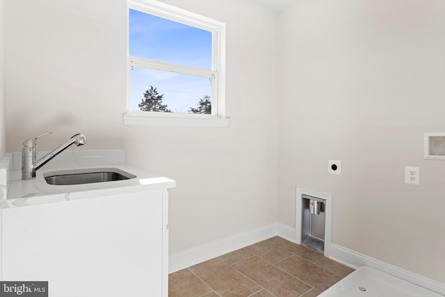 clothes washing area featuring electric dryer hookup, sink, and washer hookup