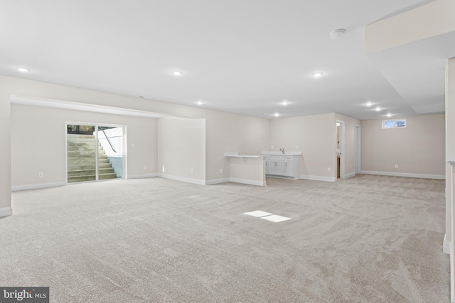 basement with light carpet