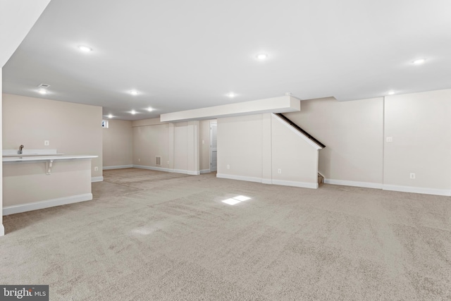 basement with light carpet