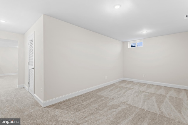 basement with light carpet