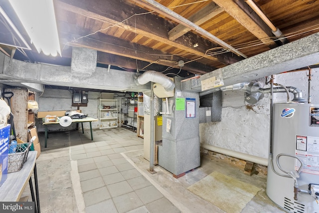 basement featuring water heater and heating unit