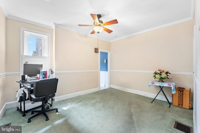 carpeted office with ornamental molding and ceiling fan