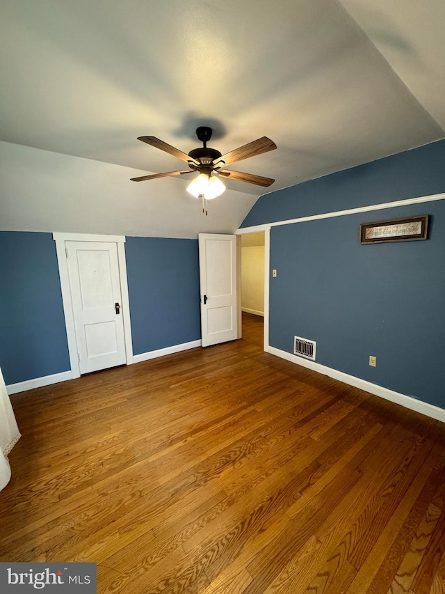 bonus room featuring hardwood / wood-style floors, ceiling fan, and lofted ceiling