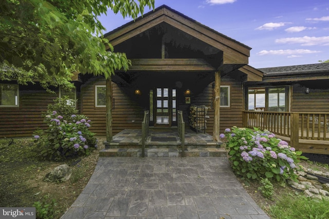 doorway to property with a porch