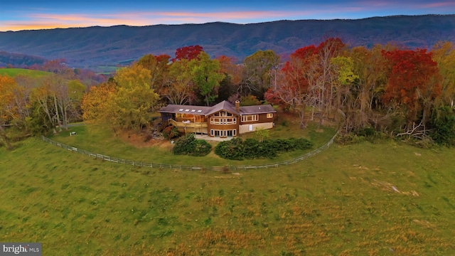 aerial view at dusk with a mountain view