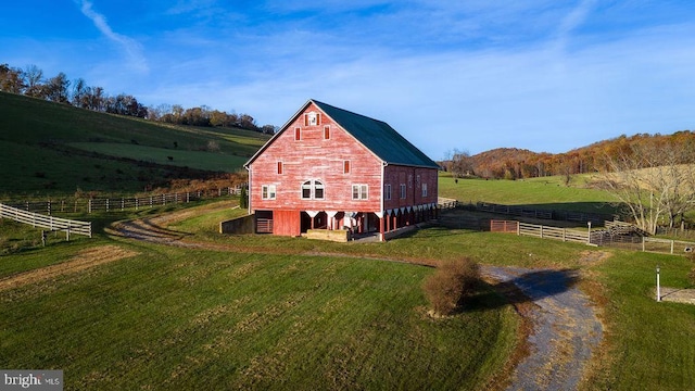 742 High Rock Rd, Raphine, VA 24472 - view of property exterior with a barn, a view of countryside, and an outbuilding