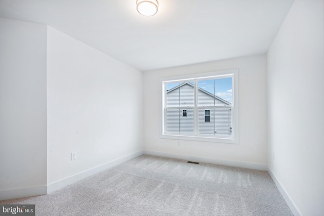 empty room with light carpet