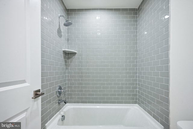 bathroom featuring shower / washtub combination