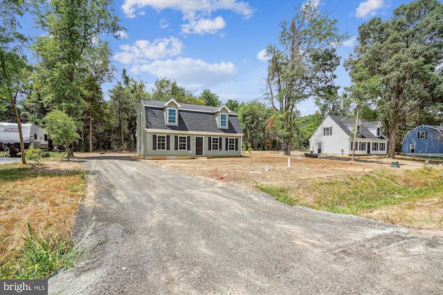 view of new england style home