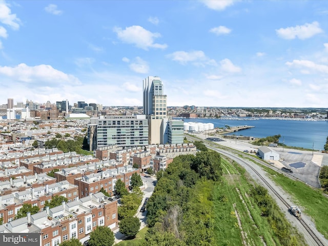 aerial view featuring a city view and a water view