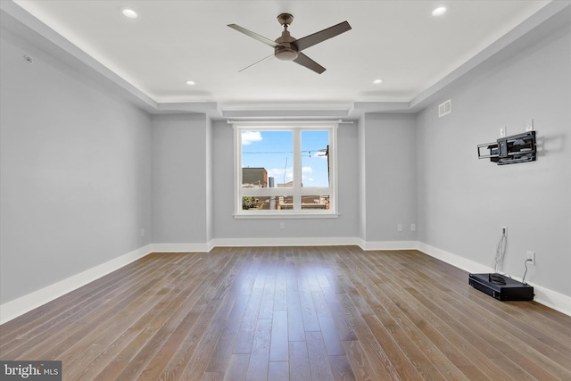 unfurnished room with ceiling fan and light hardwood / wood-style floors