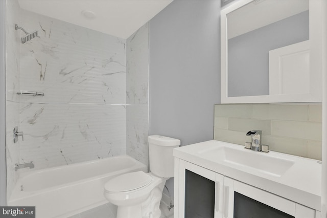 full bathroom featuring decorative backsplash, vanity, toilet, and tiled shower / bath