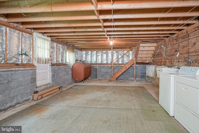 basement with washing machine and dryer