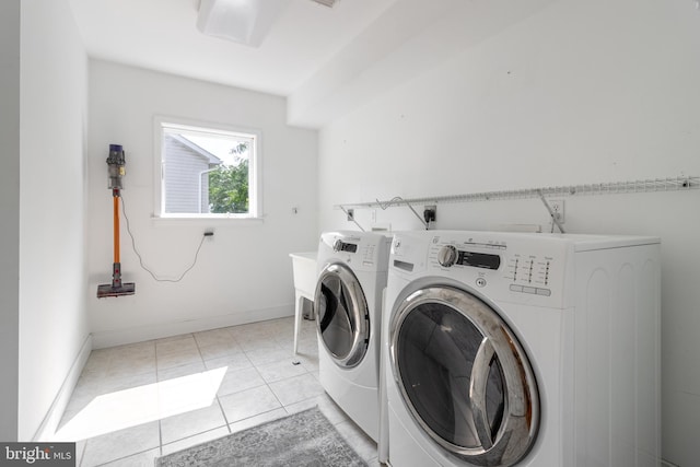 washroom with separate washer and dryer