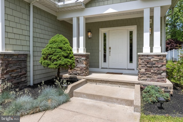 entrance to property with a porch