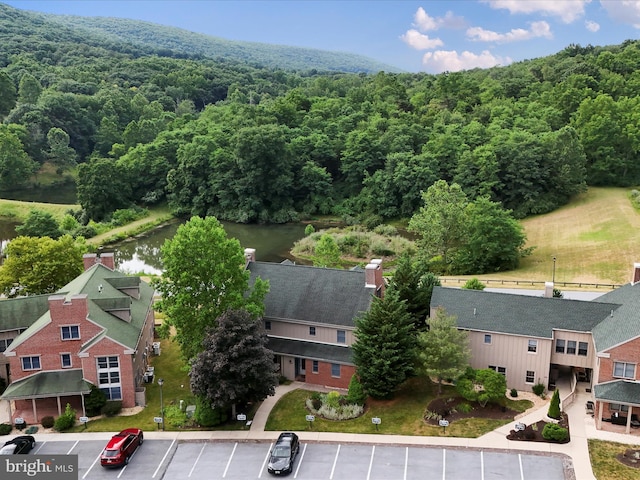 bird's eye view with a water view