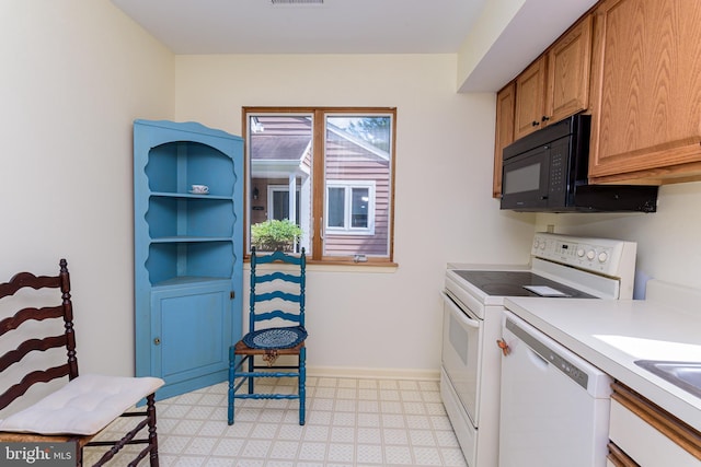 kitchen featuring white appliances