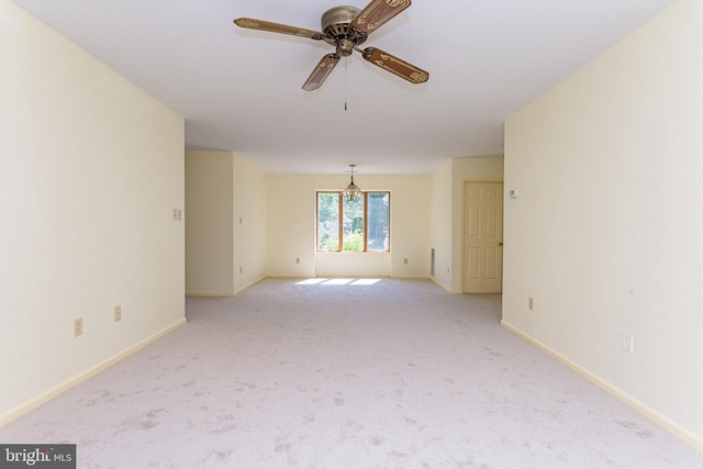 carpeted empty room with ceiling fan