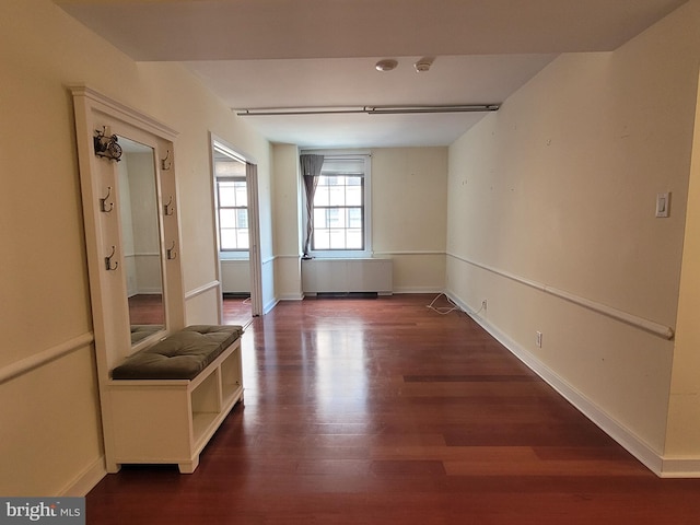 spare room with hardwood / wood-style floors