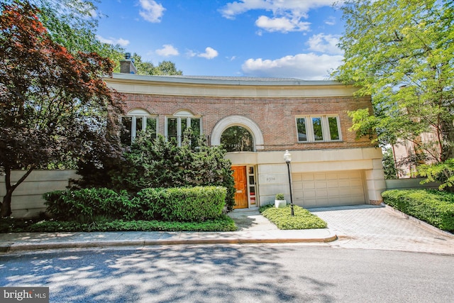 view of property featuring a garage