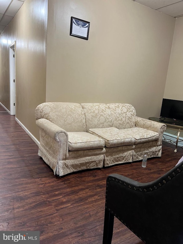 living room with dark hardwood / wood-style flooring