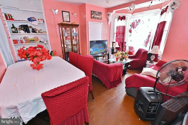 bedroom with hardwood / wood-style floors