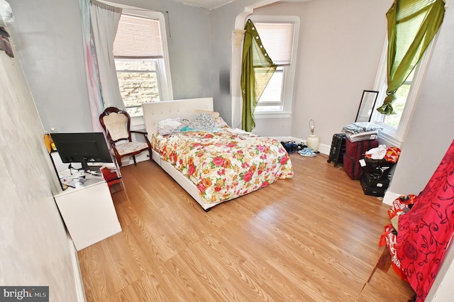 bedroom featuring light wood-type flooring