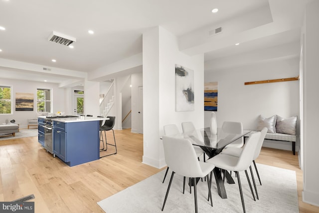 dining room featuring light hardwood / wood-style flooring