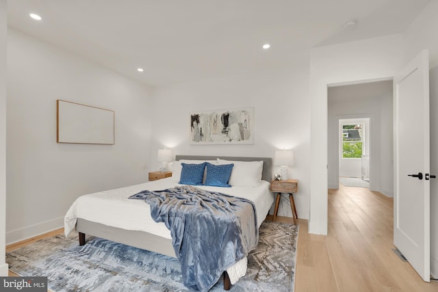 bedroom with light wood-type flooring