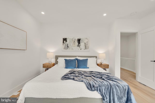 bedroom featuring light wood-type flooring