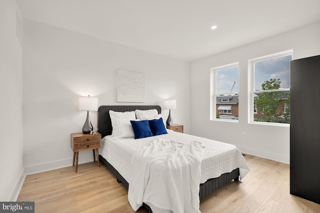 bedroom featuring light hardwood / wood-style floors